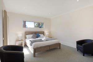 Letto o letti in una camera di Whale Cove Circuit