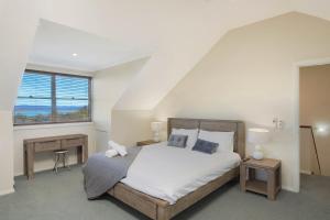 Letto o letti in una camera di Whale Cove Circuit