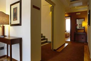 TV a/nebo společenská místnost v ubytování Hotel Messenion