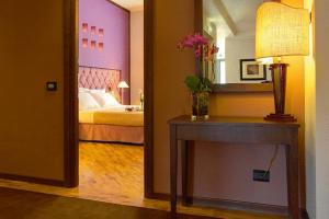 Postel nebo postele na pokoji v ubytování Hotel Messenion