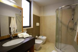 Koupelna v ubytování Hotel Messenion