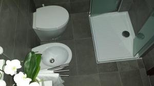 Koupelna v ubytování Hotel Friuli