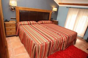 Posteľ alebo postele v izbe v ubytovaní Hotel Con Encanto La Façana