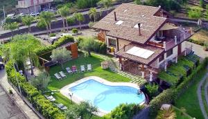 an aerial view of a house with a swimming pool at Etna Winery in Zafferana Etnea +12 photos