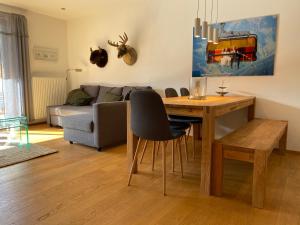 Posedenie v ubytovaní Moderne Wohnung im Botenwirt Top 6"Almhütte" + 4 fotografie