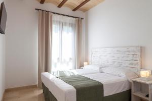 Posteľ alebo postele v izbe v ubytovaní Ad Hoc Vitae Retreats & Health Only Adults