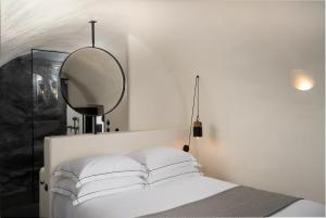 Letto o letti in una camera di Stella Rocca A Mare
