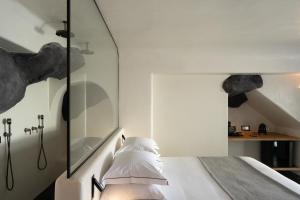 Letto o letti in una camera di Stella Rocca A Mare