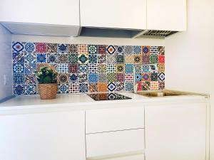 A kitchen or kitchenette at Villa Marisa - La Guarida