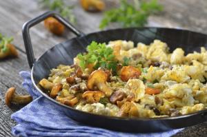 a pan filled with food on a table at Apartment Little Village in Plav +31 photos