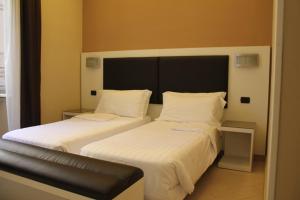 Krevet ili kreveti u jedinici u okviru objekta Hotel San Marco