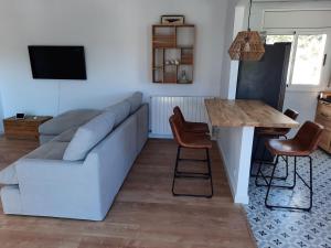 Televízia a/alebo spoločenská miestnosť v ubytovaní Villa Maioli