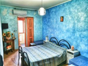 Кровать или кровати в номере B&B Santa Vittoria