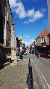 a view of an empty street in a town at Hocus Pocus Tiny Hotel in York +35 photos