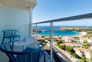 a room with a view of the ocean at Palladium Hotel Menorca in Arenal d'en Castell