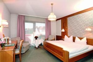 Postel nebo postele na pokoji v ubytování Hotel Restaurant Zum Hirschen