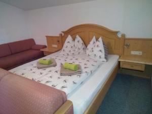 Een bed of bedden in een kamer bij Schartlhof