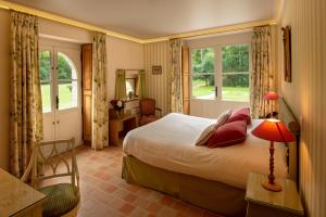 a hotel room with a bed and a window at Château-Hôtel de Bourron in Bourron-Marlotte +71 photos