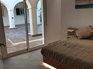 Posteľ alebo postele v izbe v ubytovaní Apartamento Puerto Marina Beach
