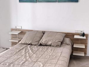 Posteľ alebo postele v izbe v ubytovaní Apartamento Puerto Marina Beach