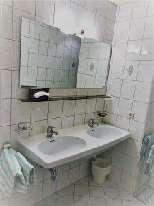 Kúpeľňa v ubytovaní Hotel Schwarzer Adler