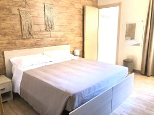 Postel nebo postele na pokoji v ubytování Messapia Casa Vacanze