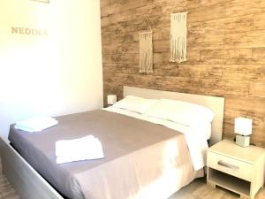 Postel nebo postele na pokoji v ubytování Messapia Casa Vacanze