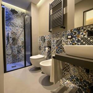 Koupelna v ubytování L'Infinito 88 Charmant Rooms