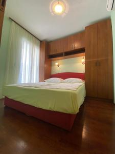 Ein Bett oder Betten in einem Zimmer der Unterkunft Apartments Linda