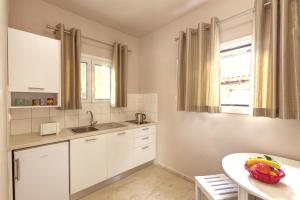 Fotografie z fotogalerie ubytování Paradise Village v destinaci Roda + 23 fotografií