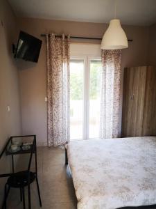 A bed or beds in a room at Irina Haus