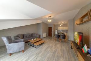 A seating area at Luxury 2-bedroom apartment by Studenets Center by Flat Mаnager