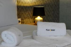 A bed or beds in a room at Luxury 2-bedroom apartment by Studenets Center by Flat Mаnager