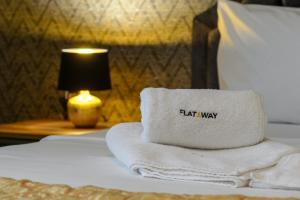 A bed or beds in a room at Luxury 2-bedroom apartment by Studenets Center by Flat Mаnager