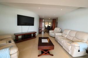 A seating area at Lazy Lizard 41 - with Inverter