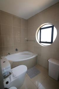 A bathroom at Lazy Lizard 41 - with Inverter