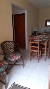 Uma área de estar em Chalés Residência Tatiane