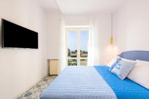 Postel nebo postele na pokoji v ubytování Dal Conte Guest House