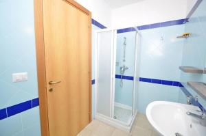 Koupelna v ubytování Residence Punta Pizzo + 21 fotografií