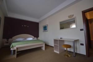 Postel nebo postele na pokoji v ubytování Hotel Zephyr - Plovanija