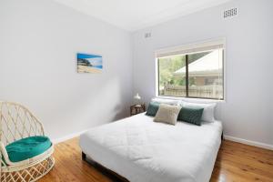 Beach Shack semi detached, 2 Min Walk to Beach - Wattle客房内的一张或多张床位