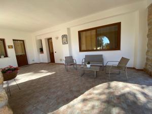 Posezení v ubytování Villa Piruzzu CV Torre Mulinazzo app P
