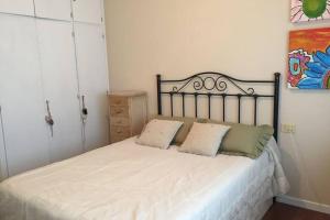 Postel nebo postele na pokoji v ubytování Apartamento Monte Lourido