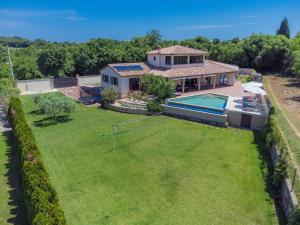 an aerial view of a house with a pool and a yard at Holiday Home Andrea - PUL463 by Interhome in Šišan