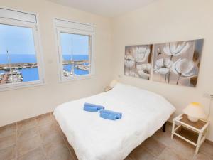 Postel nebo postele na pokoji v ubytování Apartment Triplex Mare Nostrum by Interhome