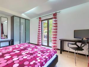 TV a/nebo společenská místnost v ubytování Holiday Home Andrea by Interhome
