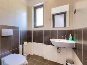 Koupelna v ubytování Holiday Home Andrea by Interhome