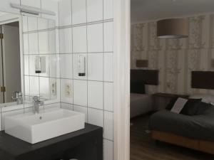 Et badeværelse på Hotel Des Roches