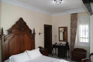 Postel nebo postele na pokoji v ubytování Hotel Playa de Regla