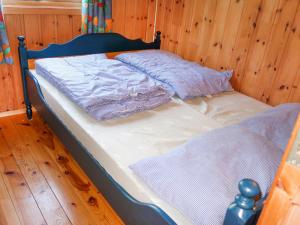Postel nebo postele na pokoji v ubytování Chalet Fosseblikk - FJS391 by Interhome